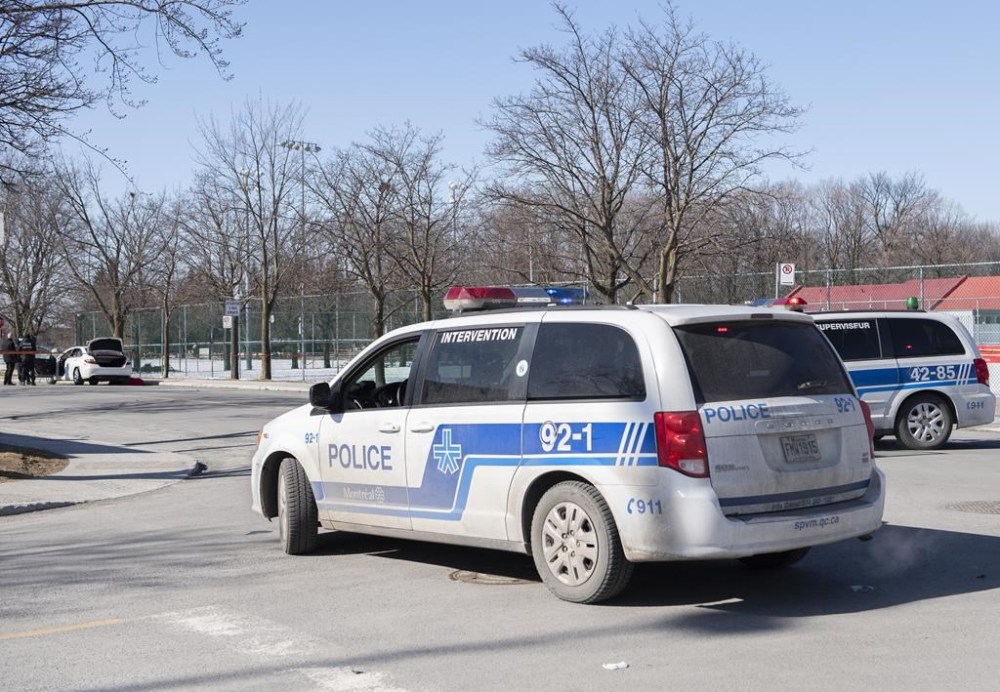 Montreal police are investigating after an incendiary object was allegedly thrown against the door of a Jewish community centre early Monday morning. Police vehicles are shown in this Friday, March 19, 2021, file photo. THE CANADIAN PRESS/Graham Hughes