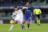 Lecce's Nikola Krstovic, left, and Verona's Isak Hien vie for the ball during the Serie A soccer match between Hellas Verona and Lecce at the Verona Marcantonio Bentegodi stadium, Italy, Monday, Nov. 27, 2023. (Paola Garbuio/LaPresse via AP)