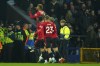 Manchester United's Marcus Rashford celebrates after scoring his side's second goal on a penalty kick during the English Premier League soccer match between Everton and Manchester United, at Goodison Park Stadium, in Liverpool, England, Sunday , Nov. 26, 2023. (AP Photo/Jon Super)