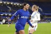Chelsea's Sam Kerr celebrates scoring their side's second goal of the game during the Women's Champions League Group D soccer match at Stamford Bridge, London, Thursday Nov. 23, 2023. ( John Walton/PA via AP)
