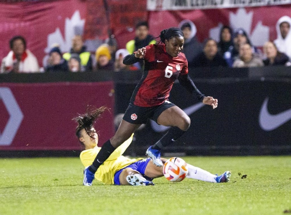 The inaugural CONCACAF W Gold Cup will be held next year in Houston, Los Angeles, San Diego and Carson, Calif., CONCACAF announced Tuesday. Canada's Deanne Rose gets past Brazil's Lauren during second half soccer action in Halifax, N.S., on Tuesday, October 31, 2023. THE CANADIAN PRESS/Ron Ward