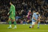 Manchester City's Josko Gvardiol, right, and Manchester City's goalkeeper Stefan Ortega reacts after Leipzig's Lois Openda scored his side's second goal during the group G Champions League soccer match between Manchester City and RB Leipzig at the Etihad stadium in Manchester, England, Tuesday, Nov. 28, 2023. (AP Photo/Dave Thompson)