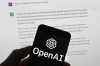 The OpenAI logo is seen on a mobile phone in front of a computer screen which displays output from ChatGPT, Tuesday, March 21, 2023, in Boston. THE CANADIAN PRESS/AP-Michael Dwyer