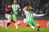 Betis' Juan Miranda, right, blocks a shot by Sparta's Jakub Pesek during the Europa League group C soccer match between Sparta Prague and Betis at the Epet Arena in Prague, Czech Republic, Thursday, Nov. 30, 2023. (AP Photo/Petr David Josek)
