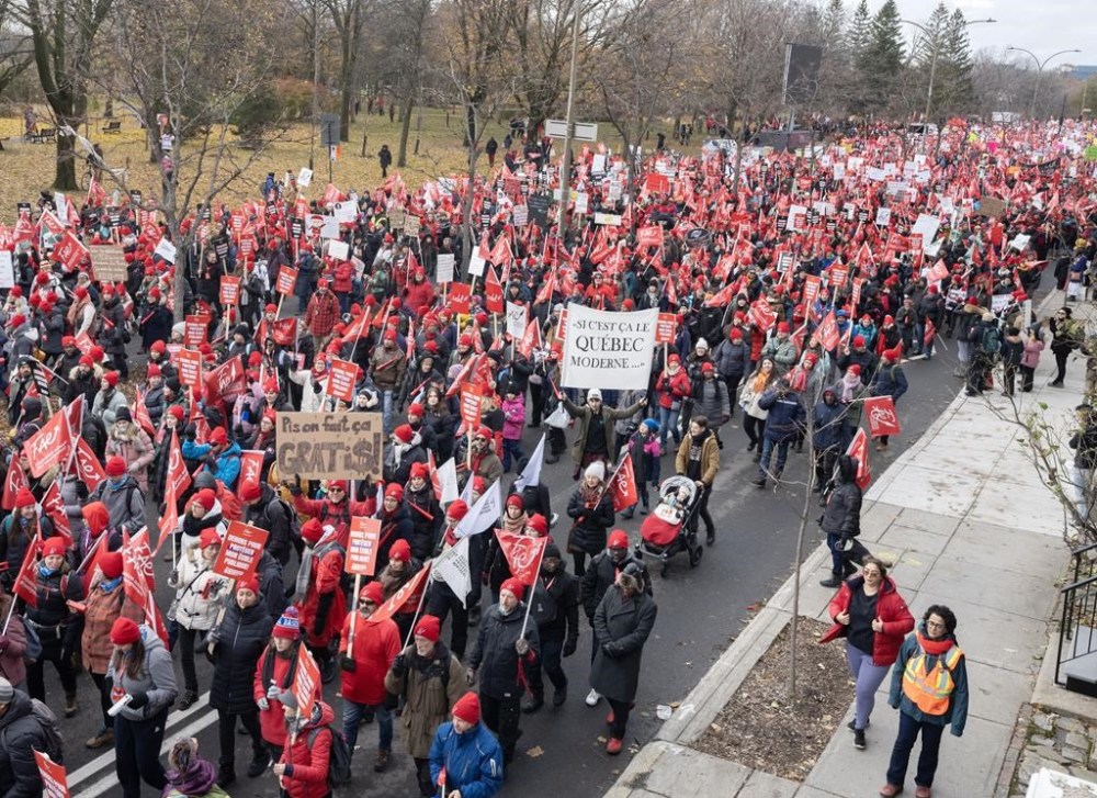 Members of the FEA teachers union march to begin their unlimited strike, Thursday, Nov. 23, 2023 in Montreal.THE CANADIAN PRESS/Ryan Remiorz