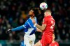 Darmstadt's Aaron Seydel, left, and Cologne's Julian Chabot fight for the ball during the Bundesliga soccer match between Cologne and Darmstadt in Darmstadt, Germany, Friday Dec. 1, 2023. (Uwe Anspach/dpa via AP)
