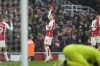 Arsenal's Martin Odegaard, centre, celebrates after scoring his side's second goal during the English Premier League soccer match between Arsenal and Wolverhampton Wanderers at the Emirates Stadium, in London, England, Saturday, Dec. 2, 2023. (AP Photo/Alastair Grant)