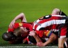 Brentford's Ben Mee celebrates scoring his side's second goal of the game with teammates, during the English Premier League soccer match between Brentford and Luton Town at the Gtech Community Stadium, in Brentford, London, Saturday, Dec. 2, 2023. (Victoria Jones/PA via AP)
