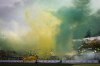 FILE - Smoke hangs over the field before the French League One soccer match between Nantes and Reims at the Stade de la Beaujoire stadium in Nantes, France, on Nov. 5, 2023. Nantes says one of its supporters has died following an assault before the club’s 1-0 win over Nice in the French league, amid reports the fan was stabbed. Nantes said in a statement in the early hours of Sunday, Dec. 3, 2023 that the fan was “fatally injured” close to the club's stadium. (AP Photo/Jeremias Gonzalez, File)