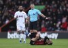Bournemouth's Adam Smith reacts after a foul by Aston Villa's Nicolo Zaniolo, during the English Premier League soccer match between Bournemouth and Aston Villa, at the Vitality Stadium, in Bournemouth, England, Sunday, Dec. 3, 2023. (Steven Paston/PA via AP)