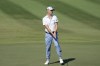 Justin Thomas, of the United States, reacts to missing a birdie putt on the first green during the final round of the Hero World Challenge PGA Tour at the Albany Golf Club, in New Providence, Bahamas, Sunday, Dec. 3, 2023. (AP Photo/Fernando Llano)