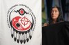 The Assembly of First Nations logo is seen as newly-appointed Interim National Chief of the Assembly of First Nations Joanna Bernard sits on stage during the AFN annual general assembly in Halifax on Thursday, July 13, 2023. THE CANADIAN PRESS/Darren Calabrese