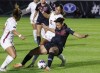 Stanford's Jasmine Aikey (12) and Florida State's Leilanni Nesbeth (13) battle for a ball during the first half of the NCAA college women's soccer tournament final in Cary, N.C., Monday, Dec. 4, 2023. (AP Photo/Ben McKeown)