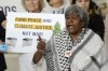 Azra Talat Sayeed participates in a demonstration advocating for peace for climate justice at the COP28 U.N. Climate Summit, Sunday, Dec. 3, 2023, in Dubai, United Arab Emirates. (AP Photo/Peter Dejong)