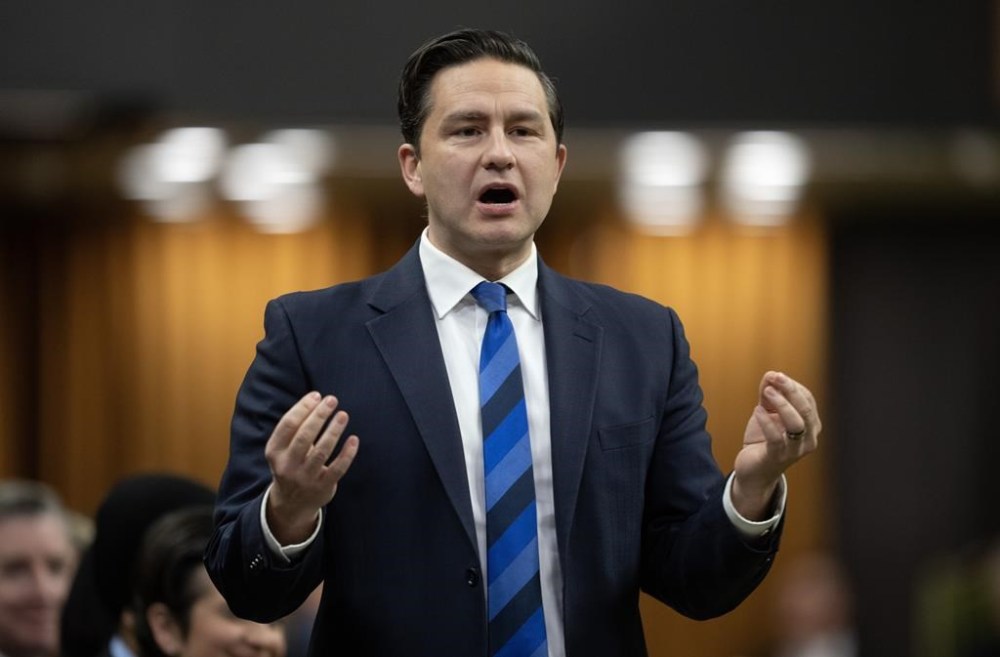Conservative Leader Pierre Poilievre rises during question period, Tuesday, Dec. 5, 2023, in Ottawa. Poilievre has been busy trying to leverage his massive social media following as the Conservatives battle with the Liberals over who's best positioned to address the country's housing crisis. THE CANADIAN PRESS/Adrian Wyld