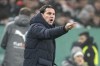 Moenchengladbach's head coach Gerardo Seoane reacts to his team during the German Soccer Cup round of 16 match between Borussia Moenchengladbach and VfL Wolfsburg in Moenchengladbach, Germany, Tuesday, Dec. 5, 2023. (AP Photo/Martin Meissner)
