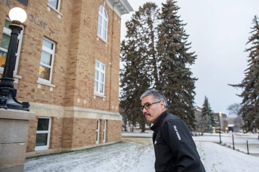 Former RCMP officer Bernie Herman enters the Court of King’s Bench on the second day of his trial in Prince Albert, Sask. on Tuesday, Dec. 5, 2023. THE CANADIAN PRESS/Liam Richards
