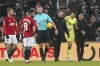 Newcastle United goalkeeper Nick Pope, second from right, is helped off the field by medical staff after picking up an injury during the English Premier League soccer match between Newcastle United and Manchester United at St. James' Park, Newcastle, England, Saturday, Dec. 2, 2023. (Owen Humphreys/PA via AP)