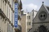 FILE - A sign advertising an hotel is pictured in Paris Thursday, July 20, 2023. French authorities will carry out checks at 10,000 hotels and restaurants across France ahead of the Paris Olympics next year in order to limit expected massive price hikes during the Games. (AP Photo/Christophe Ena, File)