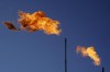 Flares burn off methane and other hydrocarbons at an oil and gas facility in Lenorah, Texas, Friday, Oct. 15, 2021. The federal Liberals will finally show details on their long-promised oil-and-gas emissions cap today. THE CANADIAN PRESS/AP, David Goldman