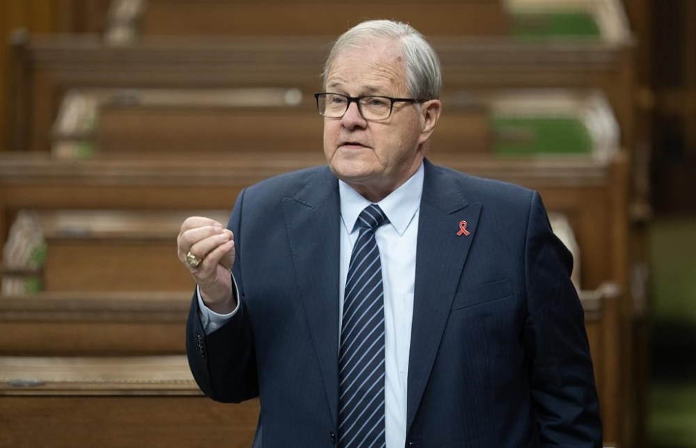 Federal Agriculture Minister Lawrence MacAulay rises during Question Period, Friday, December 1, 2023 in Ottawa. MacAulay and the Quebec agriculture minister are calling on all members of the food industry to sign on to the grocery code of conduct.THE CANADIAN PRESS/Adrian Wyld