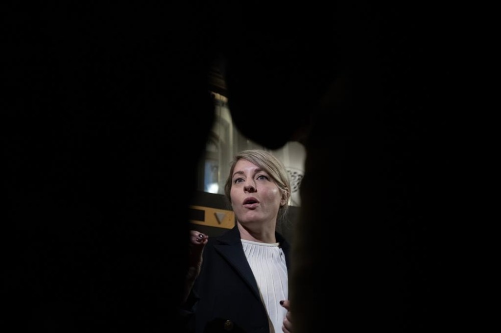 Minister of Foreign Affairs Melanie Joly speaks with reporters before a cabinet meeting in Ottawa, Tuesday, Dec. 5, 2023. Joly is condemning sexual violence committed by Hamas during its attack on Israel, after weeks of pressure to speak out.THE CANADIAN PRESS/Adrian Wyld