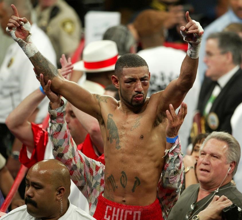 FILE - Diego Corrales, of Sacramento, Calif., celebrates winning the WBC lightweight crown by a tenth-round technical knockout over Jose Luis Castillo of Mexico, Saturday, May 7, 2005, at the Mandalay Bay Events Center in Las Vegas. Corrales was elected Thursday, Dec. 7, 2023 to the International Boxing Hall of Fame. (AP Photo/Matthew Minard, File)