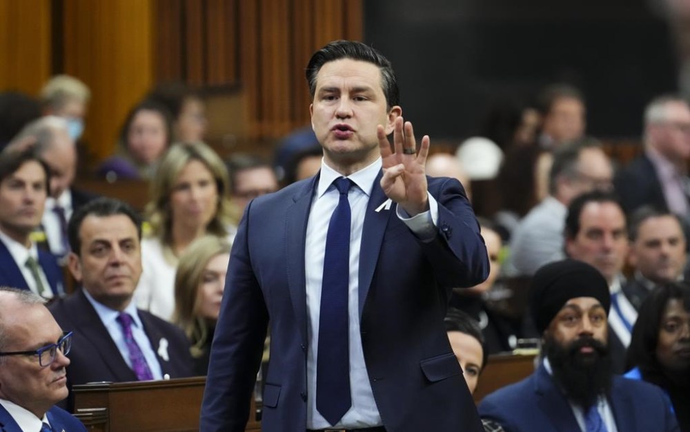 Conservative Leader Pierre Poilievre rises during question period in the House of Commons on Parliament Hill in Ottawa on Wednesday, Dec. 6, 2023. The official Opposition continues to force the delay of government bills and billions in spending in an attempt to get the Liberal government to remove the federal carbon-pricing plan from all home heating by the holidays.THE CANADIAN PRESS/Sean Kilpatrick