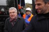 International Olympic Committee (IOC) president Thomas Bach, left, and Paris 2024 Olympics Organizing Committee President Tony Estanguet, right, arrive to visit the Olympic Village Friday, Dec. 1, 2023 in Saint-Denis, outside Paris. The Paris 2024 Olympic Games will run from July 26 to Aug.11, 2024. (AP Photo/Michel Euler)