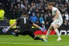 Tottenham's Dejan Kulusevski fails to score past Aston Villa's goalkeeper Emiliano Martinez during the English Premier League soccer match between Tottenham Hotspur and Aston Villa at the Tottenham Hotspur stadium in London, Sunday, Nov. 26, 2023. (AP Photo/Kirsty Wigglesworth)