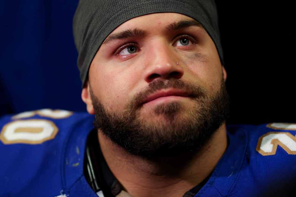 Winnipeg Blue Bombers running back Brady Oliveira (20) looks on in the dressing room after losing to the Montreal Alouettes in 110th CFL Grey Cup in Hamilton, Ont., on Sunday, November 19, 2023. THE CANADIAN PRESS/Nick Iwanyshyn