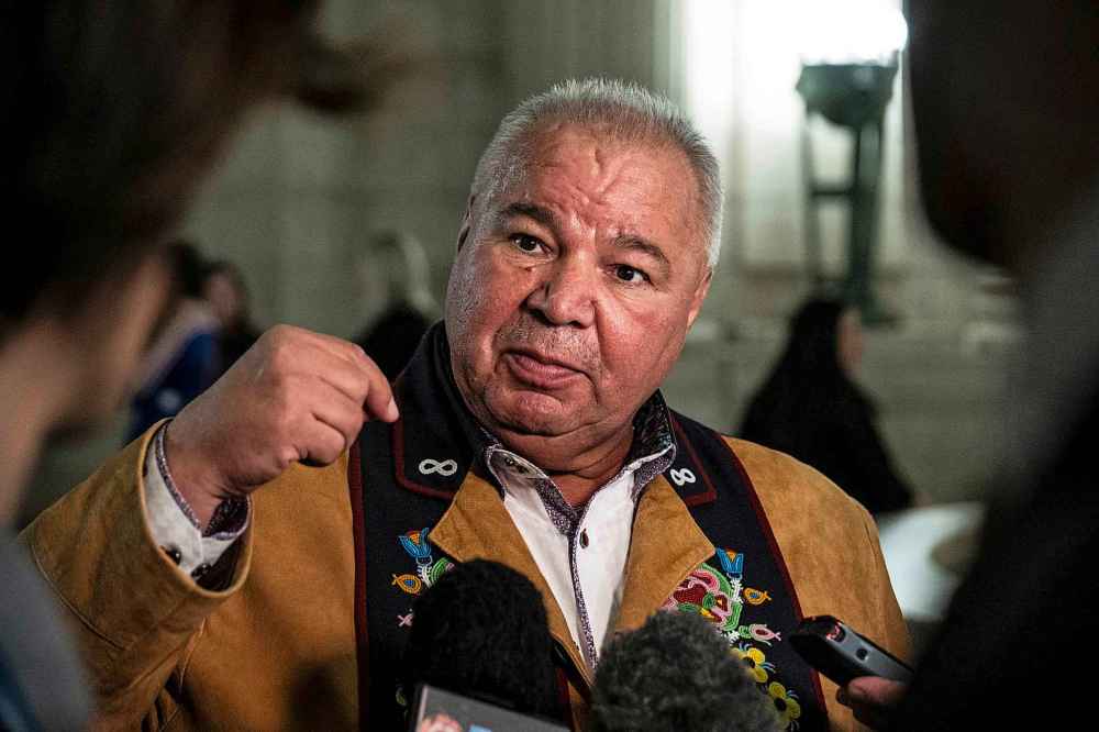 THE CANADIAN PRESS / AARON VINCENT ELKAIM
President of the Manitoba Metis Federation David Chartrand speaks to media after the completion of the 43rd Manitoba legislature speech from the throne.