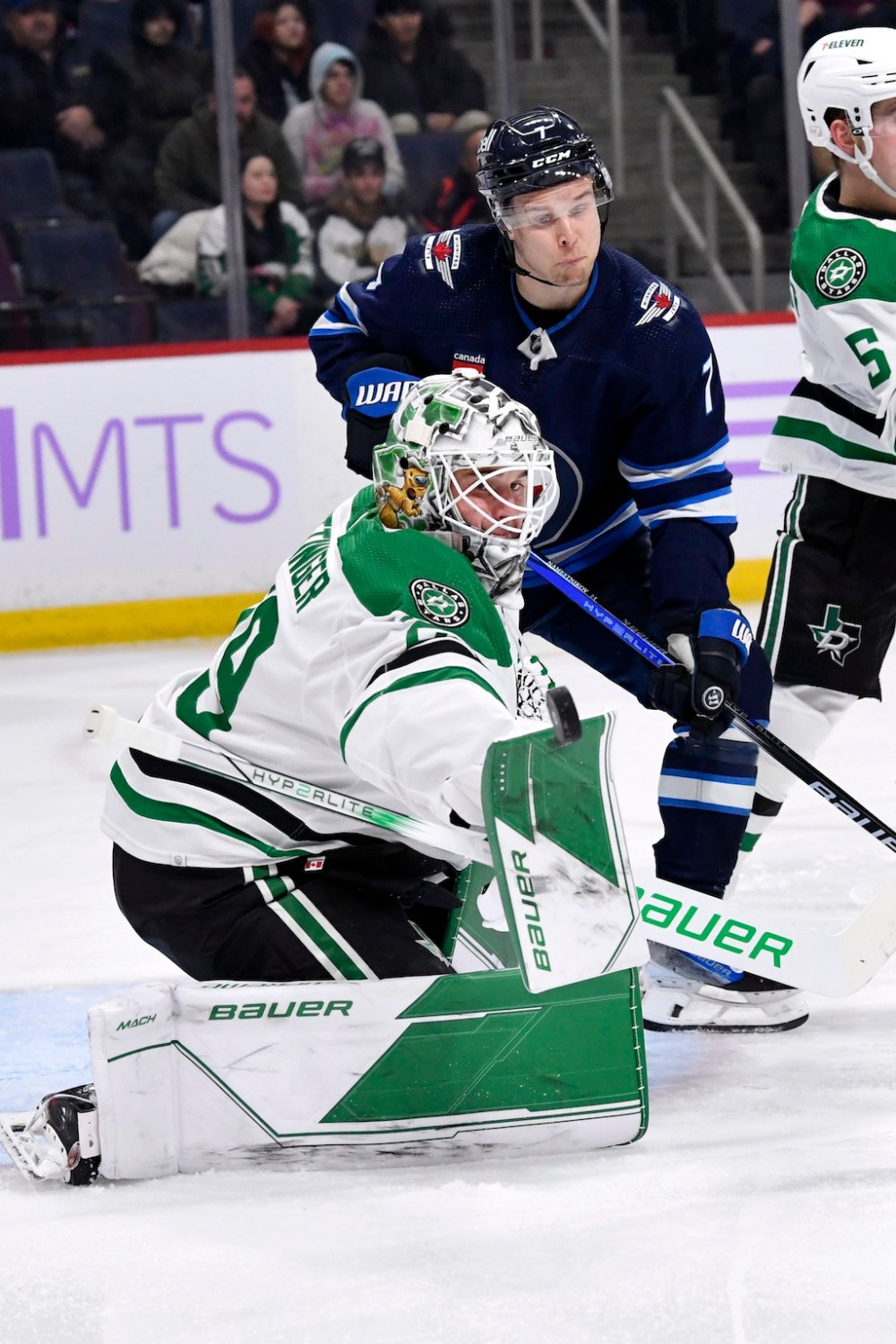 THE CANADIAN PRESS/Fred Greenslade
Dallas Stars goaltender Jake Oettinger makes a save as Winnipeg Jets' Vladislav Namestnikov looks for the rebound during the second period.