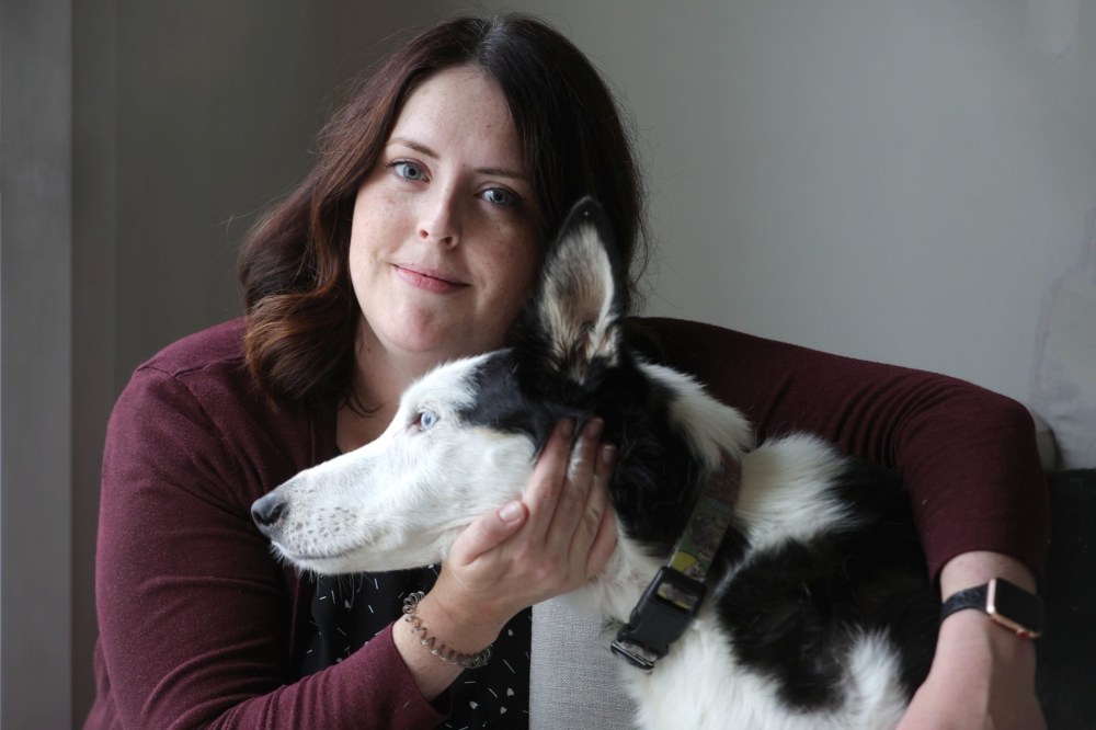 RUTH BONNEVILLE / WINNIPEG FREE PRESS
                             Winnipeg veterinarian and founder of Sunset Veterinary Care Elizabeth Andree at home with her dog, 14-year-old Jack.