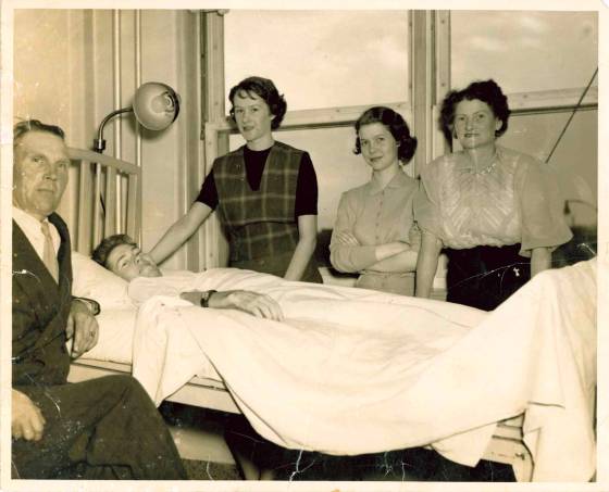 Freda Olafson standing by Ragnar’s side in the Princess Elizabeth Hospital with Ragnar’s father Oli, sister Vala and aunt Margret. (Supplied)