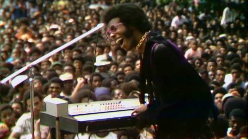 Searchlight Pictures
                                Sly Stone, seen here performing at the Harlem Cultural Festival in 1969, presents the trappings and excesses of stardom dispassionately, despite the heavy toll they took on him and the band.