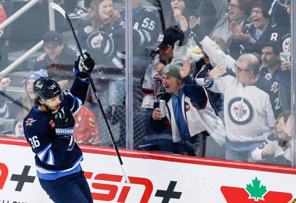 JOHN WOODS / THE CANADIAN PRESS

Winnipeg’s Morgan Barron celebrates his goal against Chicago goaltender Arvid Soderblom during second-period action Saturday.