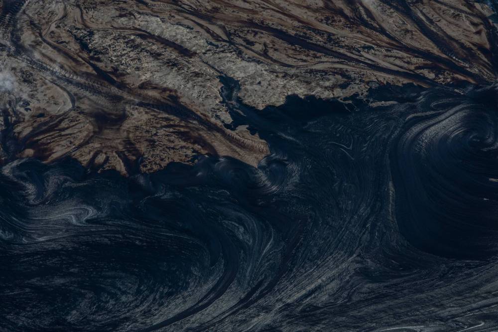 AMBER BRACKEN FOR THE NARWHAL 
                                A tailings pond at a Suncor open-pit oilsands mine near Fort McMurray, Alta. If tailings ponds from all of the oilsands mines were combined, they would cover an area twice the size of Vancouver.