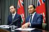 MIKE DEAL / WINNIPEG FREE PRESS
                                Premier Wab Kinew (right) and Finance Minister Adrien Sala