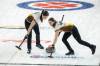 Andrew KLaver / Curling Canada files
                                Karlee Burgess (left) and Emily Zacharias sweep durng the 2023 Scotties Tournament in Kamloops, B.C.