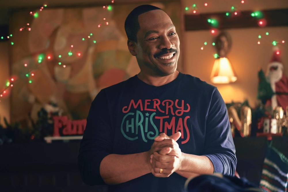Eddie Murphy makes a deal with an elf in Prime Video's Candy Cane Lane. (Claudette Barius / Prime)