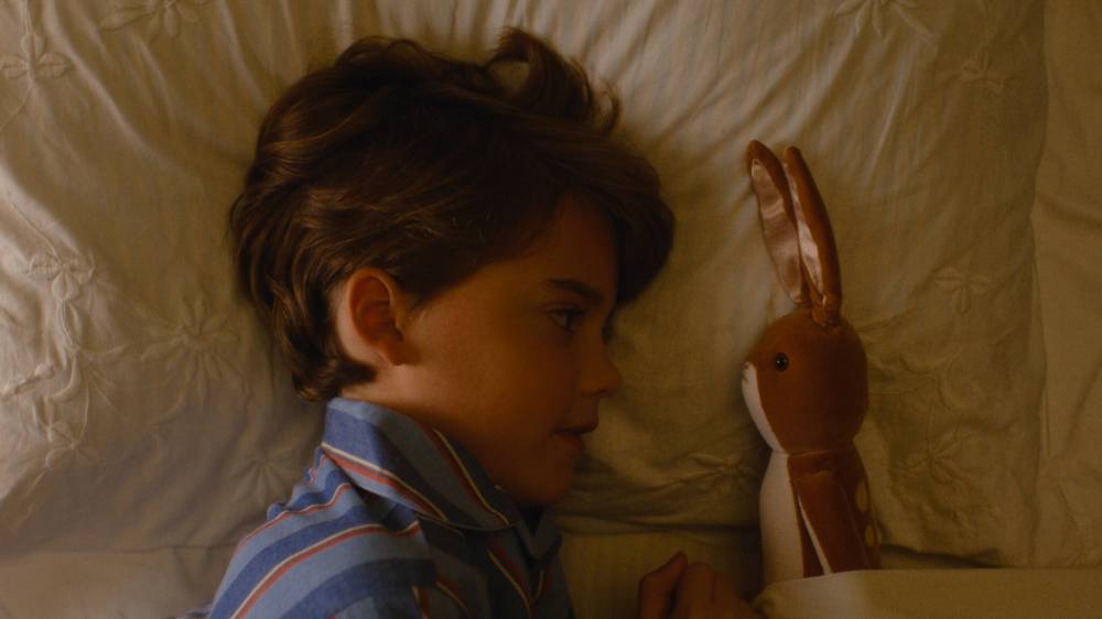 Phoenix Larouche plays an introverted boy in Apple TV's the Velveteen Rabbit. (Apple +)