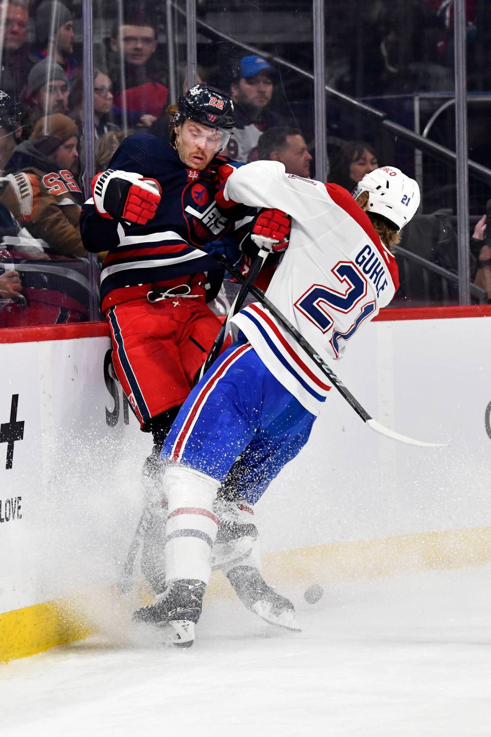 THE CANADIAN PRESS/Fred Greenslade
Montreal Canadiens’ Kaiden Guhle checks Winnipeg Jets’ Mason Appleton during the second period.