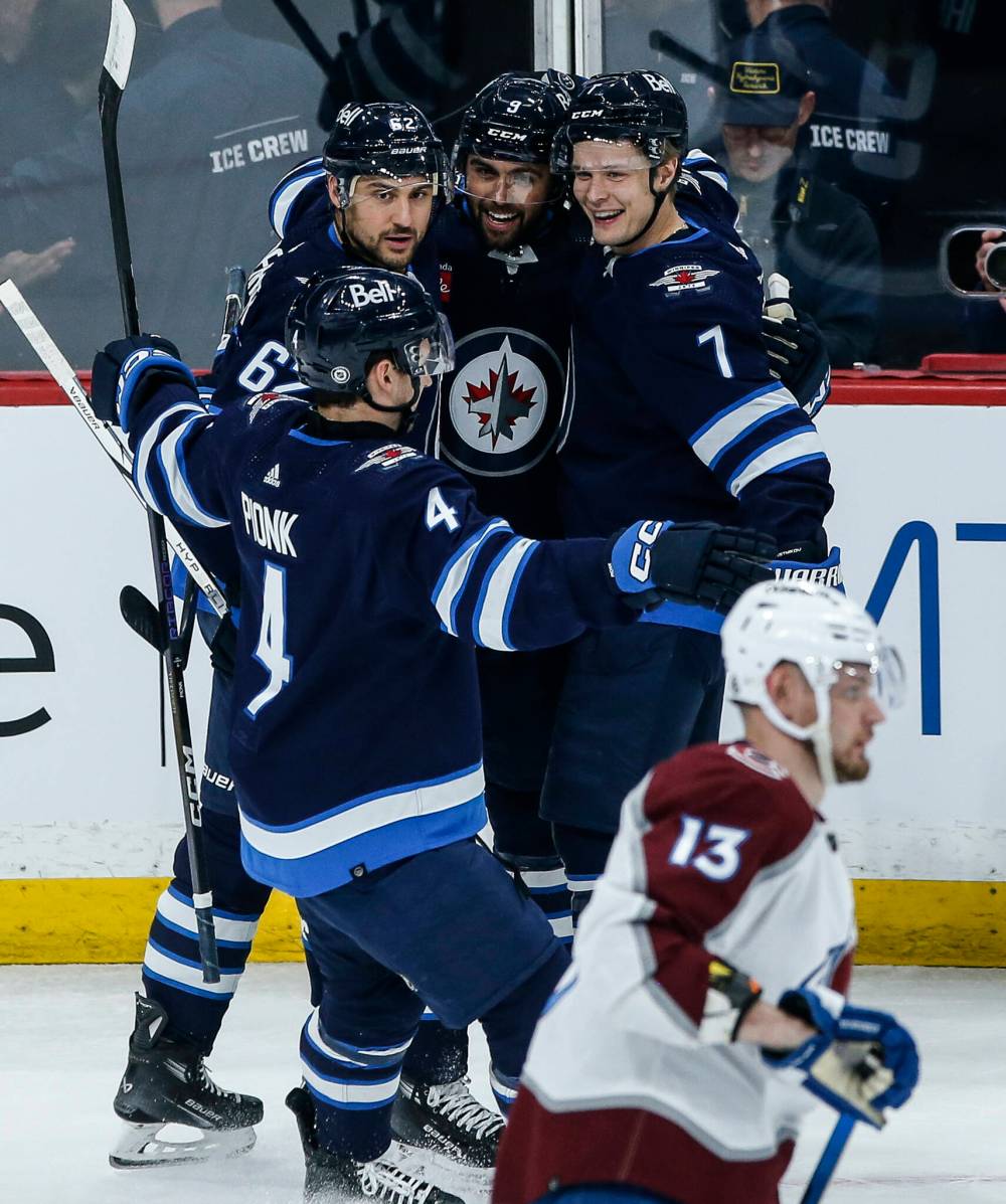 John Woods / THE CANADIAN PRESS
Vladislav Namestnikov (right) celebrate his power-play goal against the Colorado Avalanche on Saturday. His first-period goal was the only time the Jets have scored with the man advantage in their last 21 opportunities.