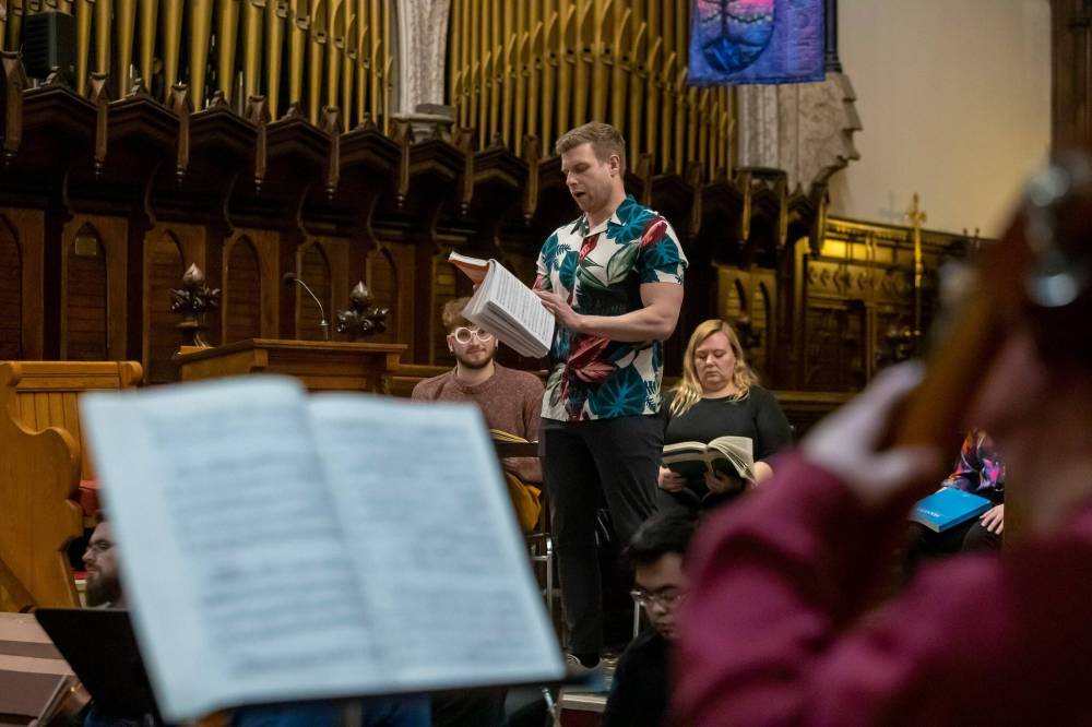 Bass-baritone Stephen Haiko-Pena takes part in a dress rehearsal Wednesday of Messiah Queered at Holy Trinity Anglican Church. (Brook Jones / Winnipeg Free Press)