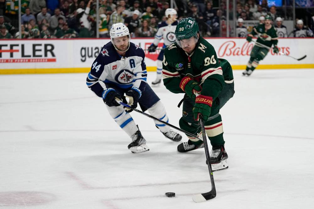 ABBIE PARR / ASSOCIATED PRESS FILES
                                Marcus Johansson (right) and the Wild face a double header against Josh Morrissey and the Jets this weekend.