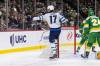 Winnipeg Jets center Adam Lowry (17) celebrates after a goal during the second period of an NHL hockey game against the Minnesota Wild, Sunday, Dec. 31, 2023, in St. Paul, Minn. (Bailey Hillesheim / The Associated Press)