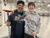 Richard Norman, left, Curling Canada's new Director of Community Futures and Innovations and his son Riel, are shown in this handout image from March 2023 at Toronto's Royal Canadian Curling Club. THE CANADIAN PRESS/HO