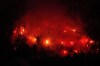 Fans light flares on the stands during the French League One soccer match between Olympique de Marseille and Lyon at the Velodrome Stadium in Marseille, France, Wednesday, Dec. 6, 2023. (AP Photo/Daniel Cole)