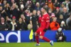 Liverpool's Alexis Mac Allister celebrates after scoring his side's second goal during the English Premier League soccer match between Liverpool and Fulham at the Anfield stadium in Liverpool, England, Sunday, Dec. 3, 2023. (AP Photo/Jon Super)
